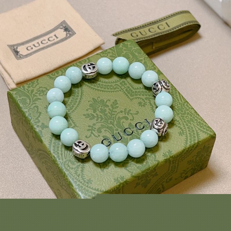 G*u*i bracelets